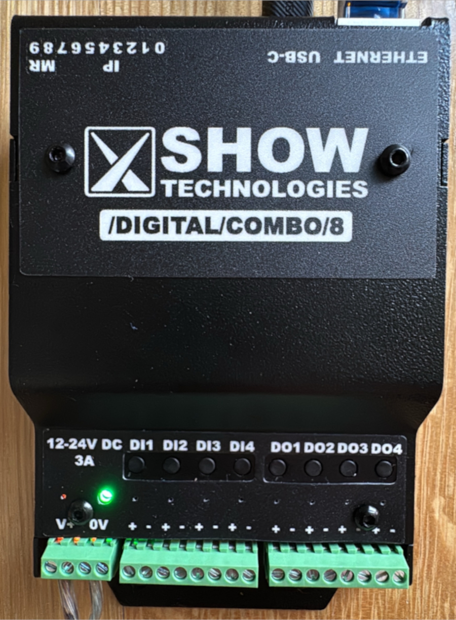 /digital/combo/8 plugged into USB-C power and 24v power and connected to a network
